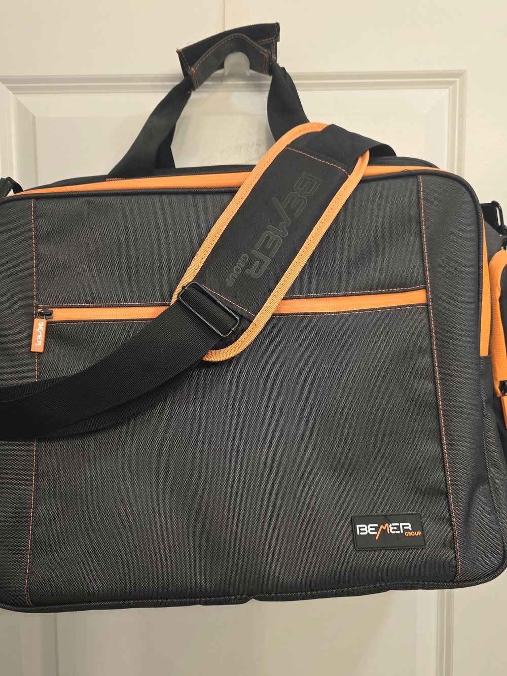 Official BEMER Group Travel Bag / Briefcase (20" x 12.5") – Black & Orange